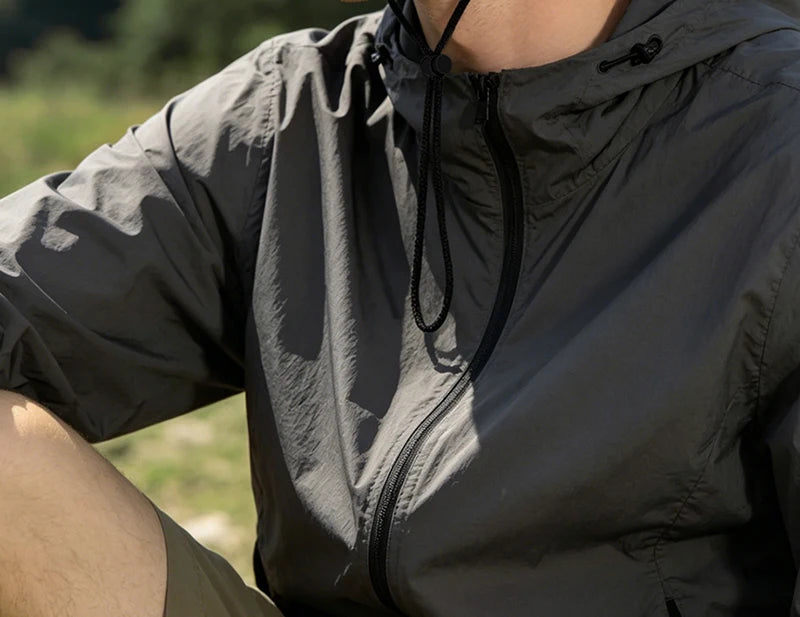 Hiker and Mountain Print Outdoor Bucket Hat: Wide-brimmed, breathable bucket hat with drawstring, perfect for hiking and camping